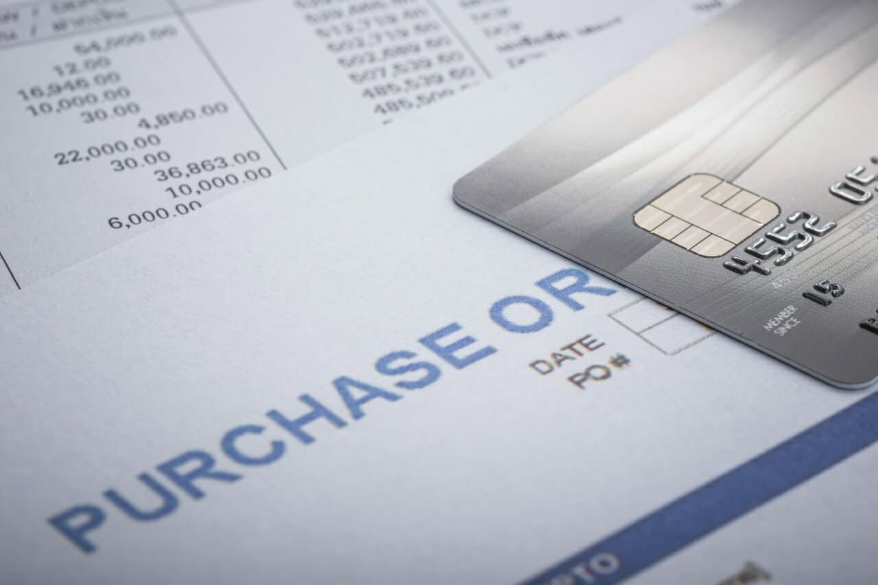 close-up-credit-card-on-purchase-order-in-the-office-for-financial-or-business-use