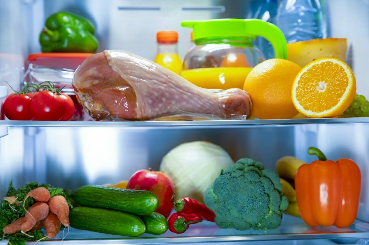 open-fridge-turkey-drumstick-fresh-vegetables-fruits-fresh-juice
